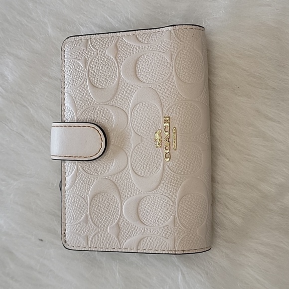 Coach Handbags - 🔥Coach🔥white wallet with classic monogram